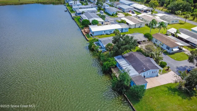 an aerial view of a house with a garden