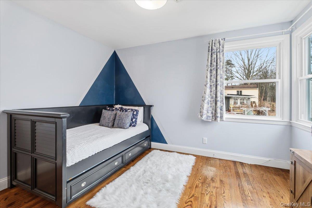 39 Darling Avenue New Rochelle, NY 10804 - Photo 12 of 19 a bedroom with a bed and a window