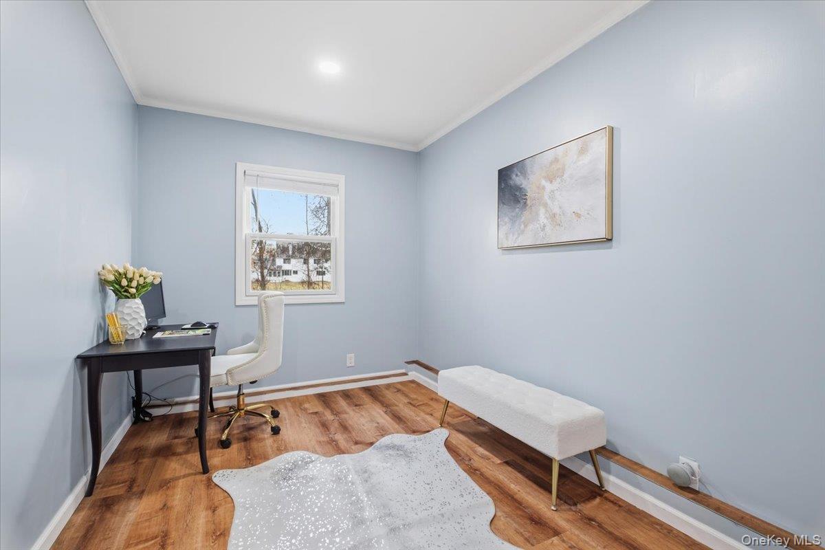 39 Darling Avenue New Rochelle, NY 10804 - Photo 8 of 19 a bedroom with a bed and a desk