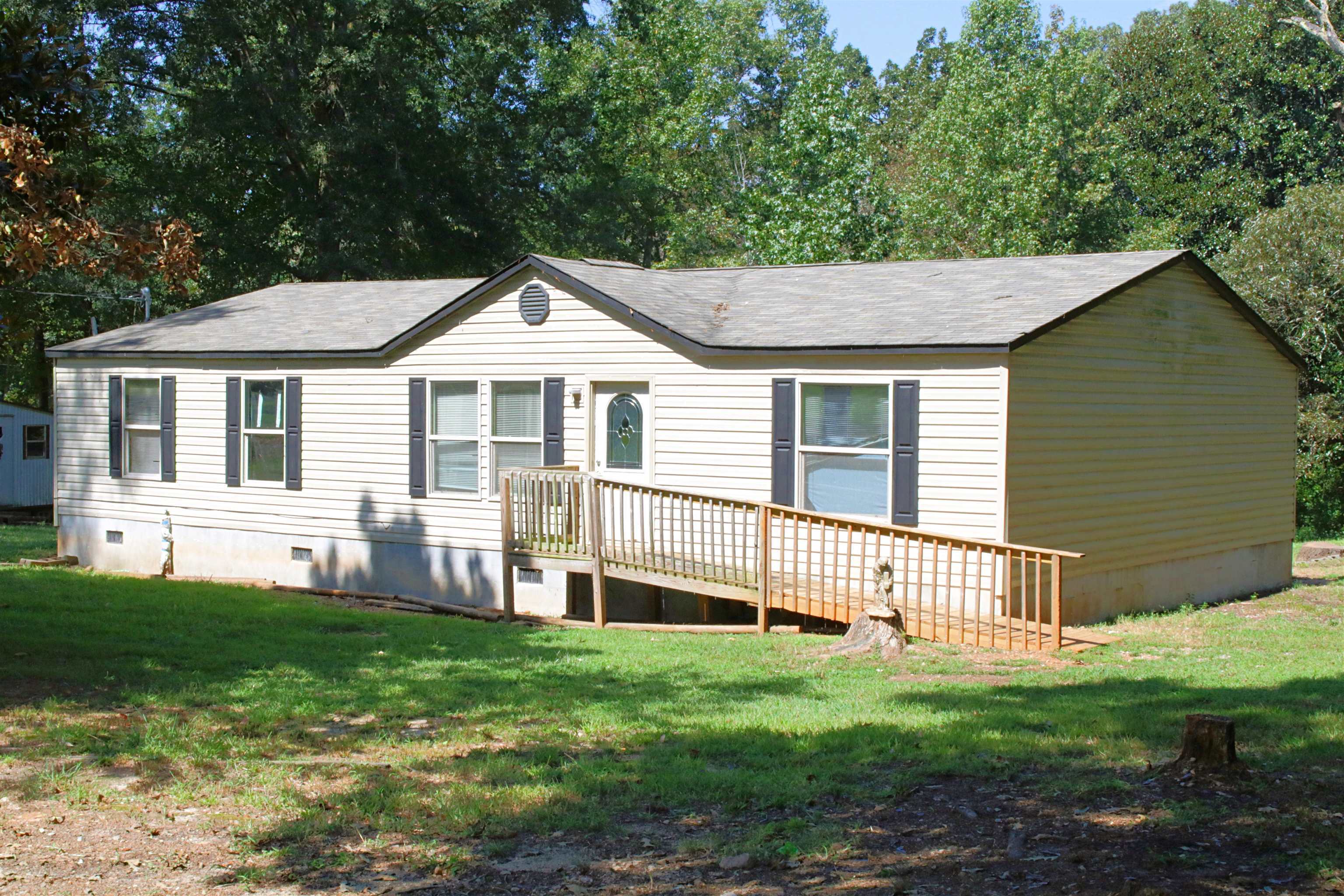 419 Old Commerce Road Extension Athens, GA 30607 - Photo 1 of 1 a front view of a house with a yard