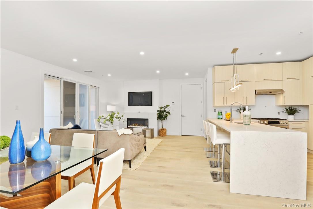 145 Library Lane, Unit 4A Mamaroneck, NY 10543 - Photo 6 of 27 Nine foot tall ceilings, gas fireplace, and loft like feeling