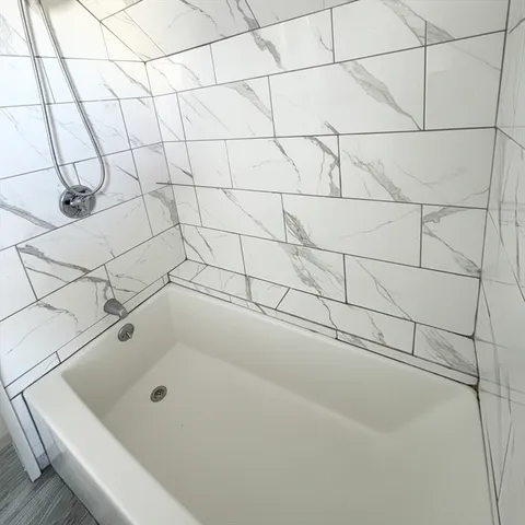 a bathroom with a bathtub