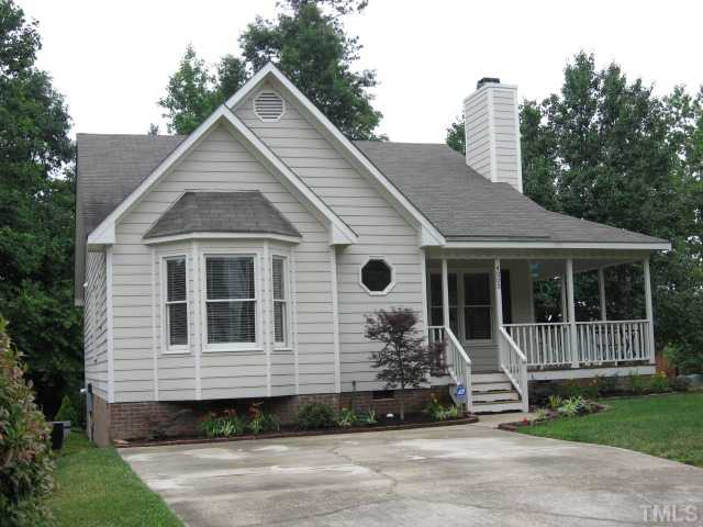 4000 Old Coach Road Raleigh, NC 27616 - Photo 1 of 12 a front view of a house with a yard