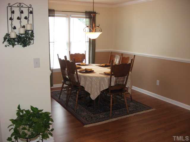 4000 Old Coach Road Raleigh, NC 27616 - Photo 8 of 12 a view of a dining room with furniture and window