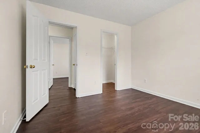 a bathroom with a sink toilet vanity and shower