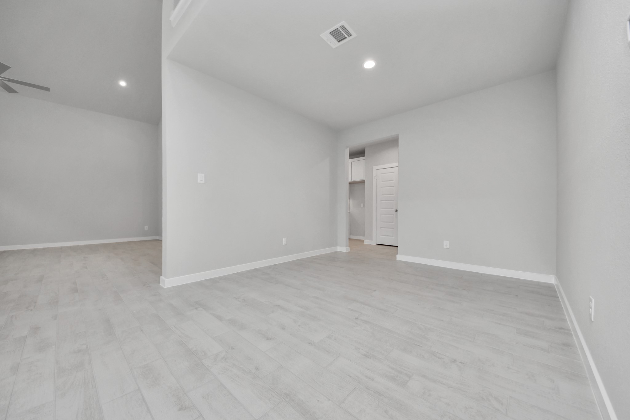11114 Tulip Rdg Trail Houston, TX 77044 - Photo 6 of 30 Make memories gathered around the table with your family and friends! This spacious dining room features elegant flooring, custom paint, and adjacent to family room and kitchen for open concept feel. Sample photo of completed home with similar floor plan. Actual colors and selections may vary.