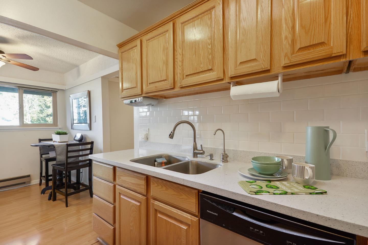 500 West Middlefield Road, Unit 93 Mountain View, CA 94043 - Photo 11 of 29 a kitchen with a sink cabinets and appliances