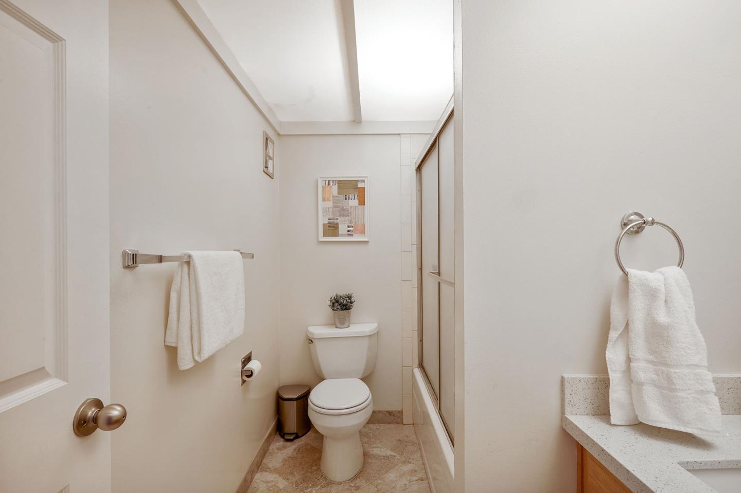 500 West Middlefield Road, Unit 93 Mountain View, CA 94043 - Photo 15 of 29 a bathroom with a toilet and a mirror