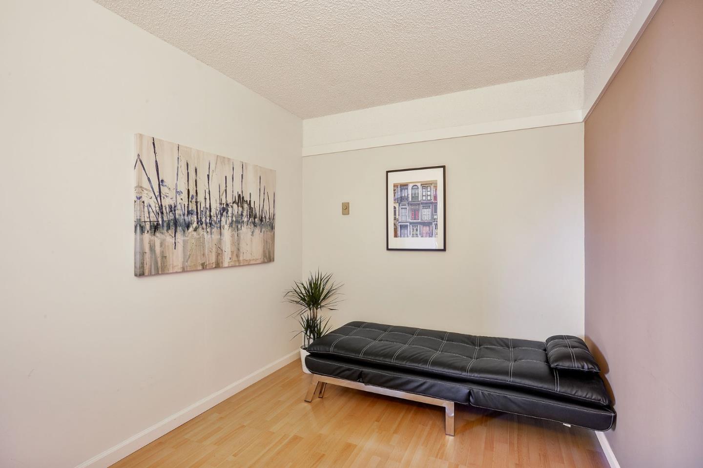 500 West Middlefield Road, Unit 93 Mountain View, CA 94043 - Photo 17 of 29 a bed sitting in a room next to a window