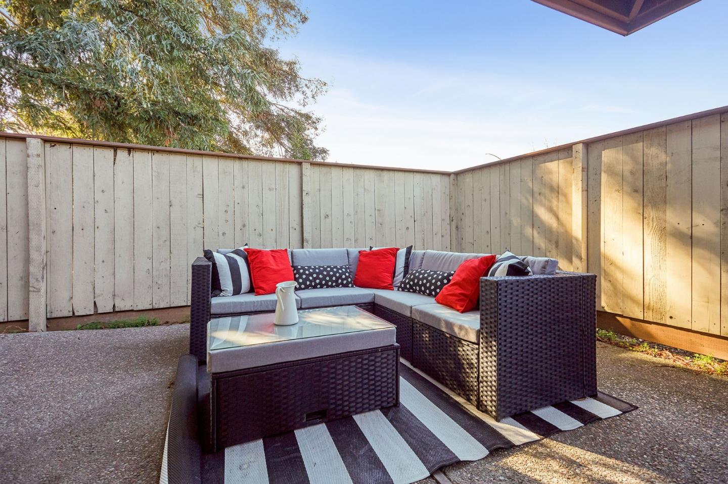 500 West Middlefield Road, Unit 93 Mountain View, CA 94043 - Photo 18 of 29 a outdoor living space with furniture and a potted plant