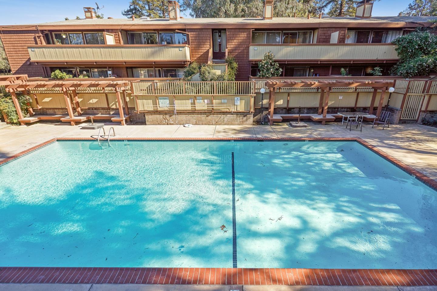 500 West Middlefield Road, Unit 93 Mountain View, CA 94043 - Photo 25 of 29 a view of a house with pool