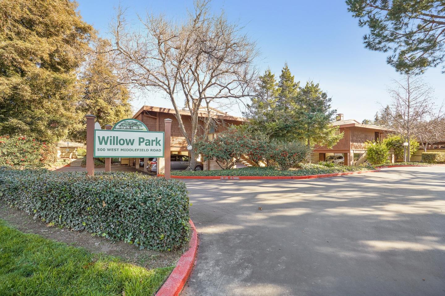 500 West Middlefield Road, Unit 93 Mountain View, CA 94043 - Photo 27 of 29 a view of a house with a yard and large trees