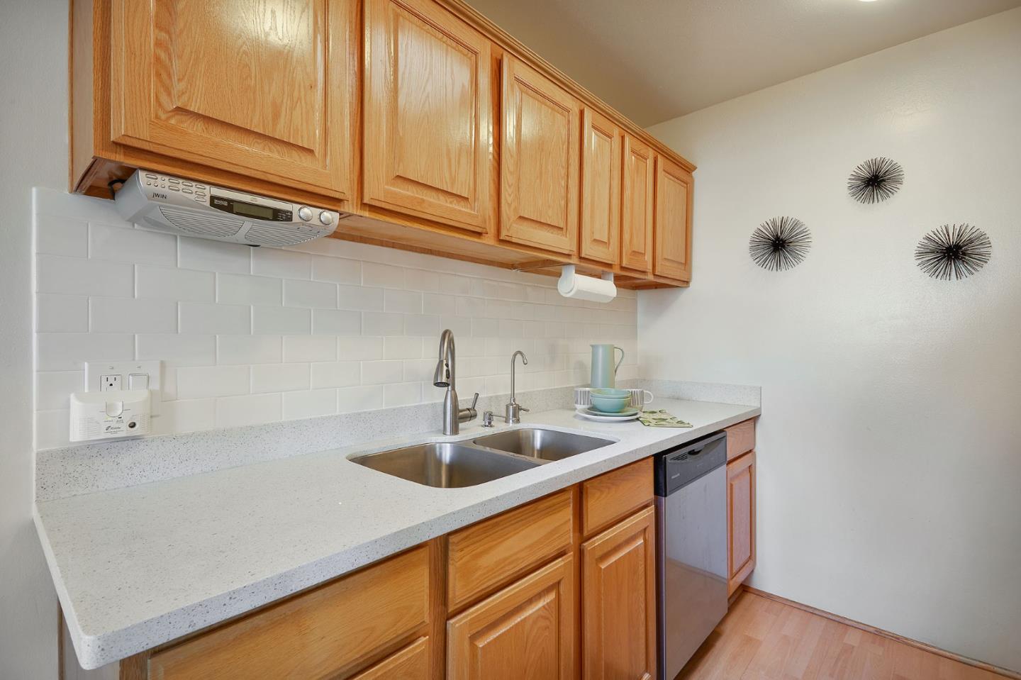 500 West Middlefield Road, Unit 93 Mountain View, CA 94043 - Photo 9 of 29 a kitchen with stainless steel appliances granite countertop a sink and cabinets
