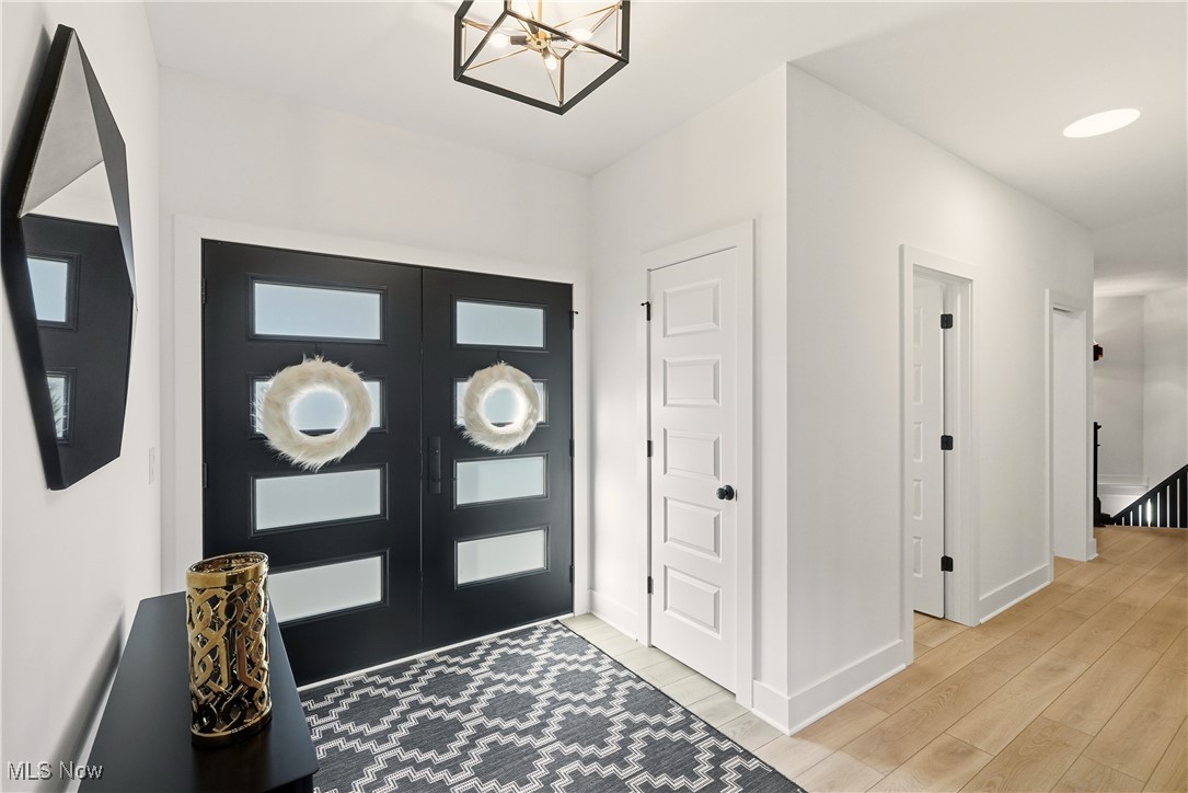 5906 Russia Road Amherst, OH 44001 - Photo 11 of 50 Entryway with upgraded contemporary doors