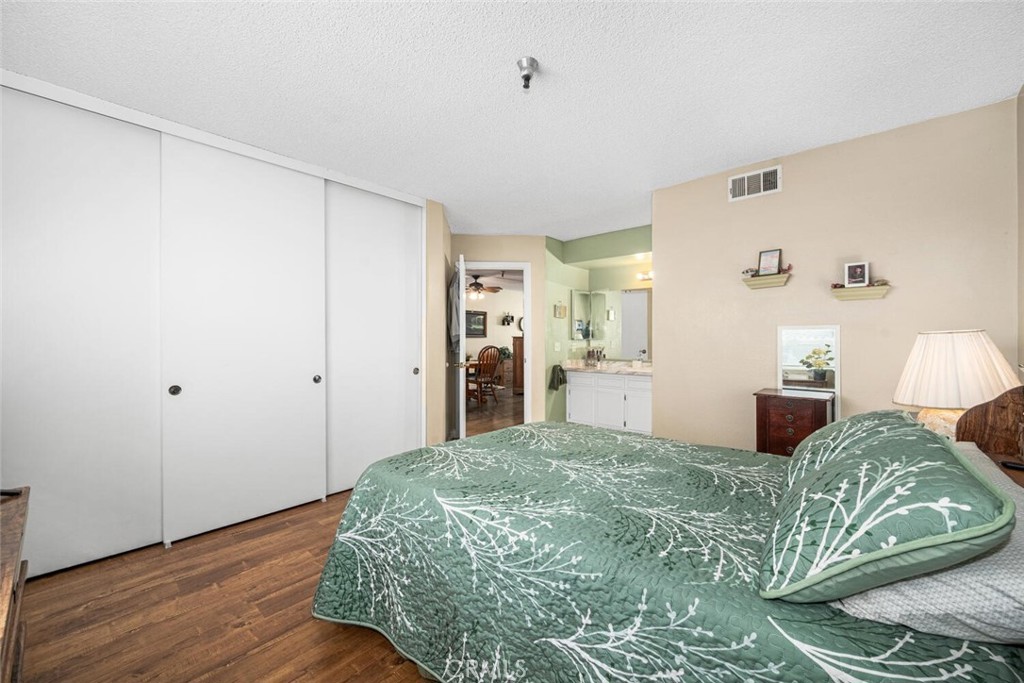 701 South Hayward Street, Unit B Anaheim, CA 92804 - Photo 16 of 31 Super big closet in the master with built-in shelving.
