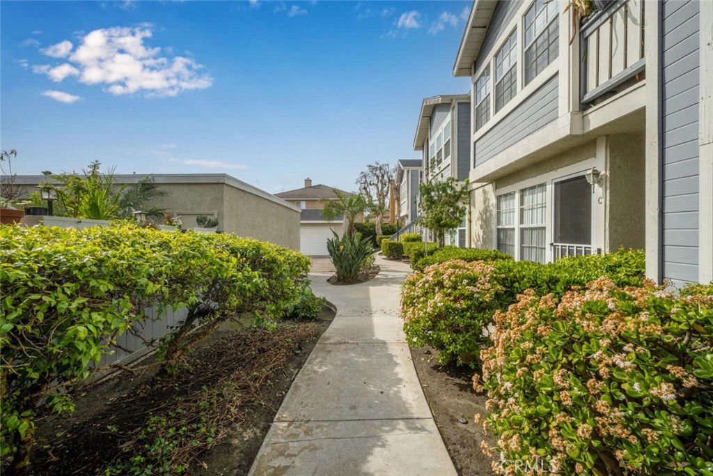 701 South Hayward Street, Unit B Anaheim, CA 92804 - Photo 3 of 31 Unit B is at the end of the walkway it is steps away from the 2 car garage.