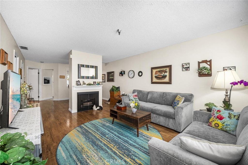 701 South Hayward Street, Unit B Anaheim, CA 92804 - Photo 31 of 31 Spacious floor plan with a nice fireplace.