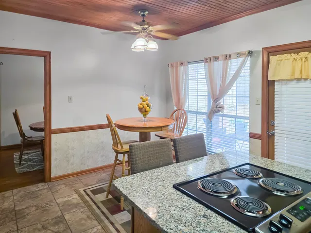 a bedroom with a bed and a mirror