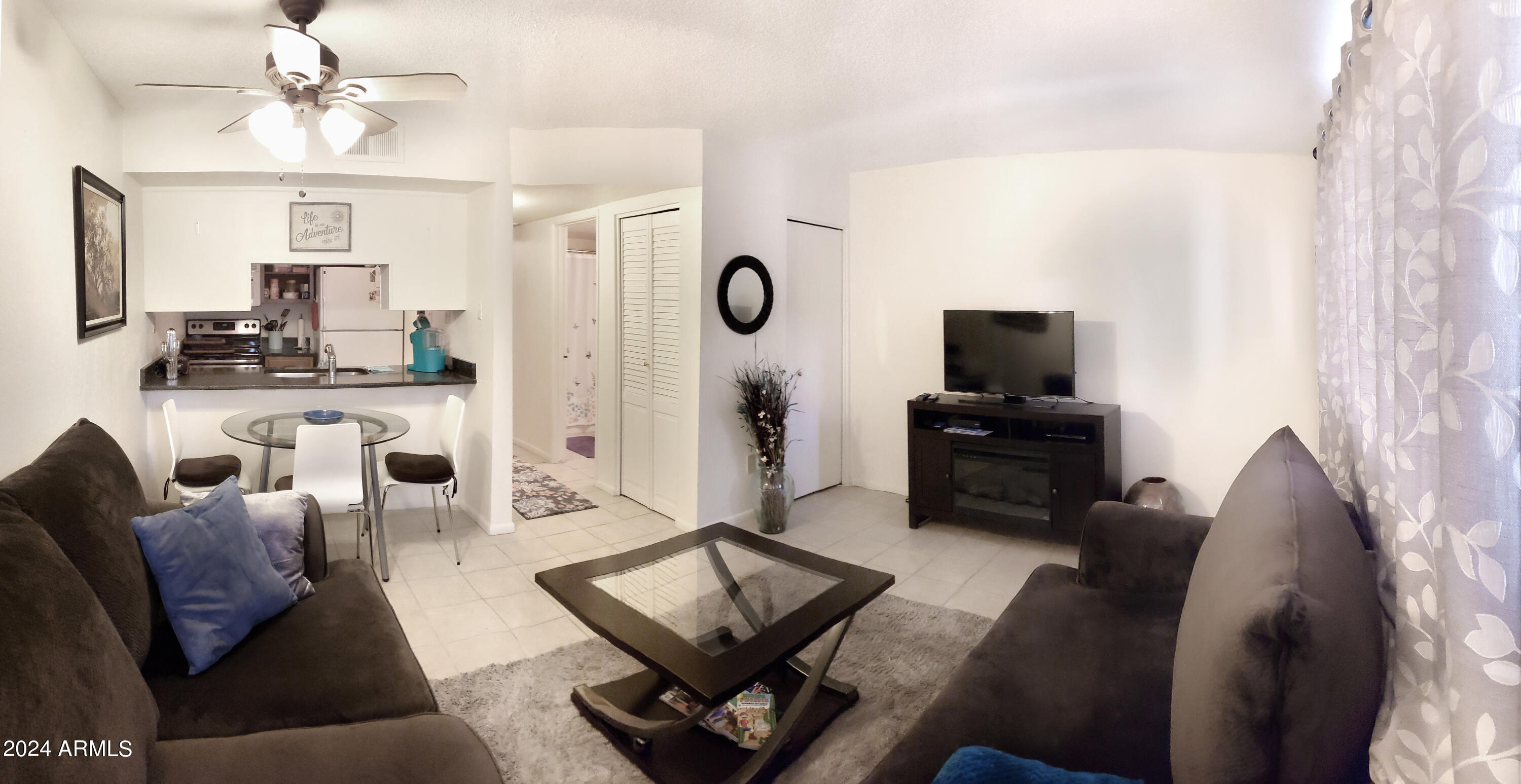 7436 East Chaparral Road, Unit 120B Scottsdale, AZ 85250 - Photo 2 of 24 a living room with furniture