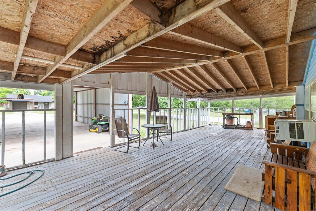 210 7th Street Blanket, TX 76432 - Photo 5 of 33 a patio with wooden floors and patio