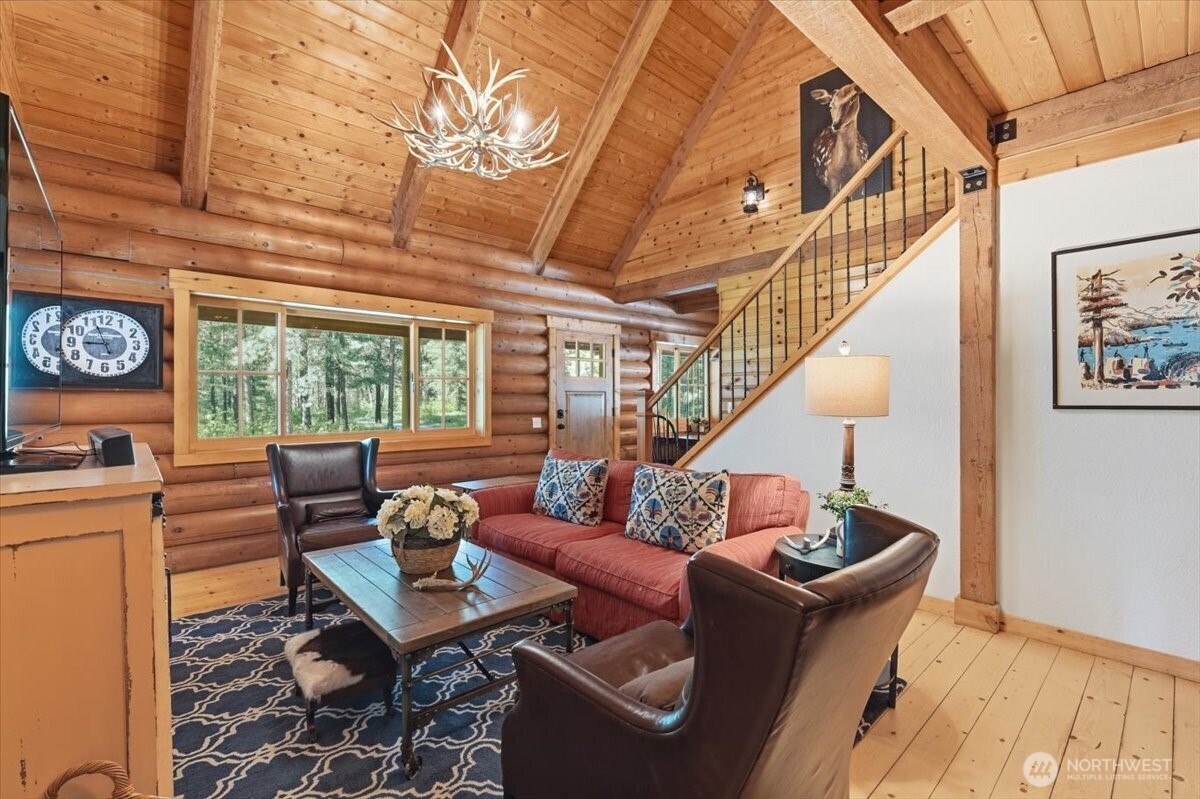 2250 First Crk Road Chelan, WA 98816 - Photo 11 of 39 a living room with furniture and a window