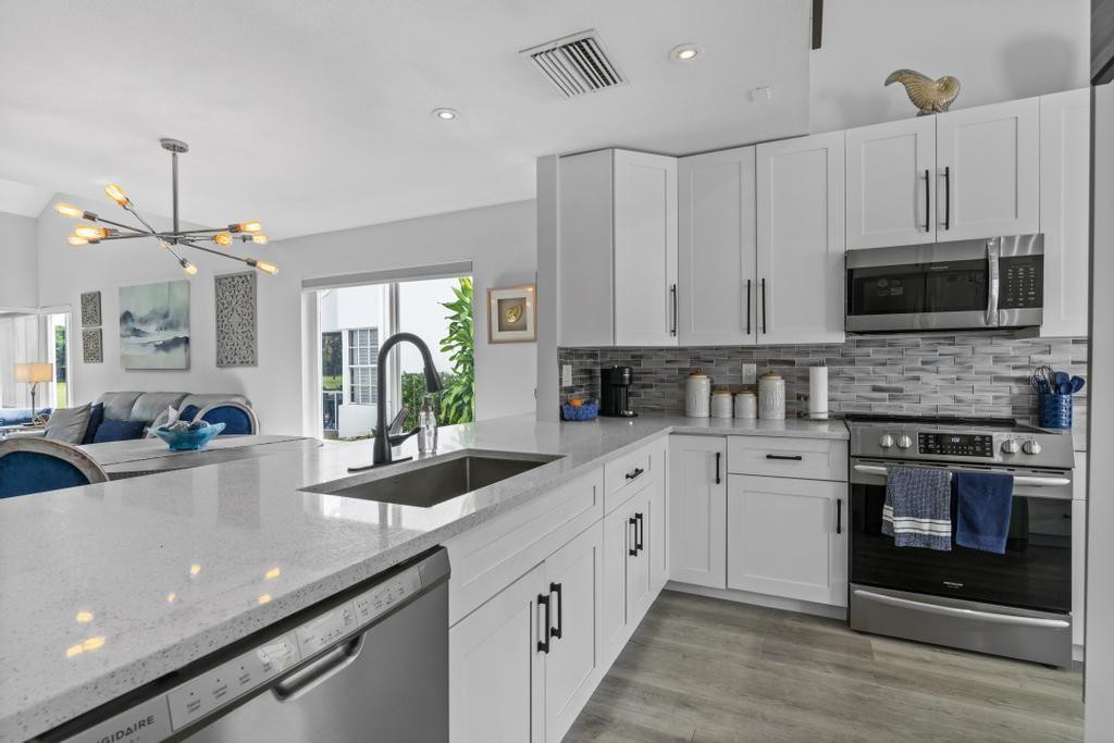 17082 Boca Club Boulevard, Unit 6 Boca Raton, FL 33487 - Photo 16 of 54 Stone Counter, Stainless Appliances