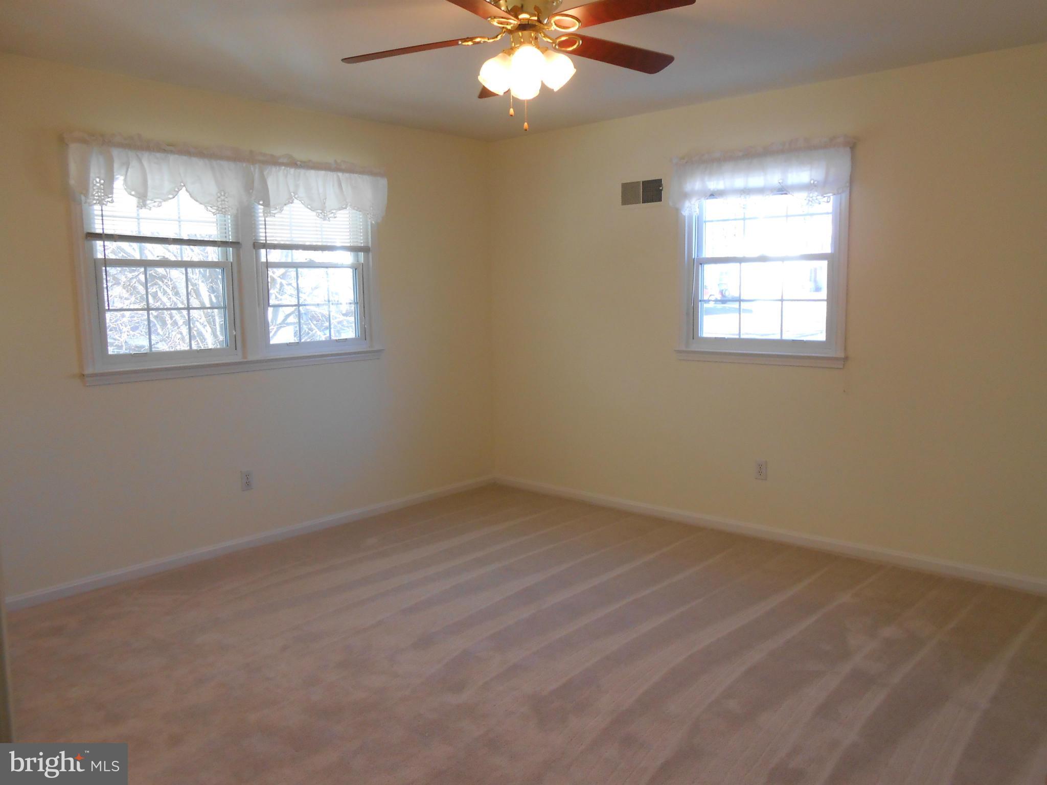 6956 Conservation Drive Springfield, VA 22153 - Photo 14 of 30 an empty room with a window