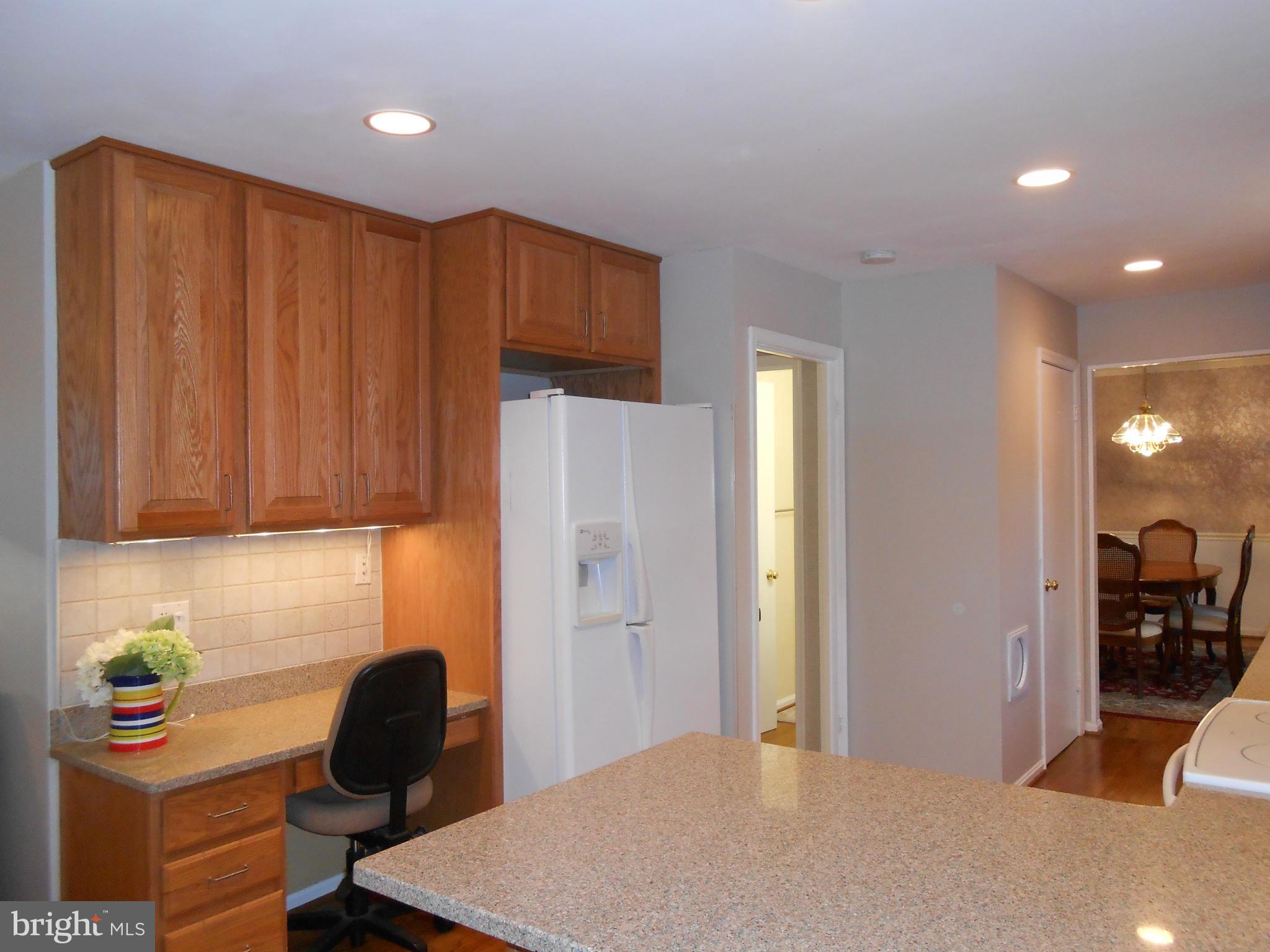 6956 Conservation Drive Springfield, VA 22153 - Photo 8 of 30 a workspace with furniture and window