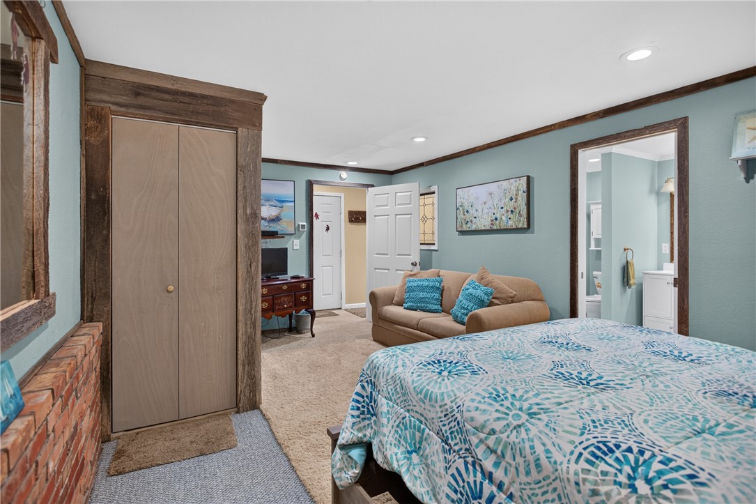351 River Road Westminster, SC 29693 - Photo 36 of 50 Comfortable bedroom retreat with plush carpeting and a convenient full bathroom access. Located on level beside garage for privacy.