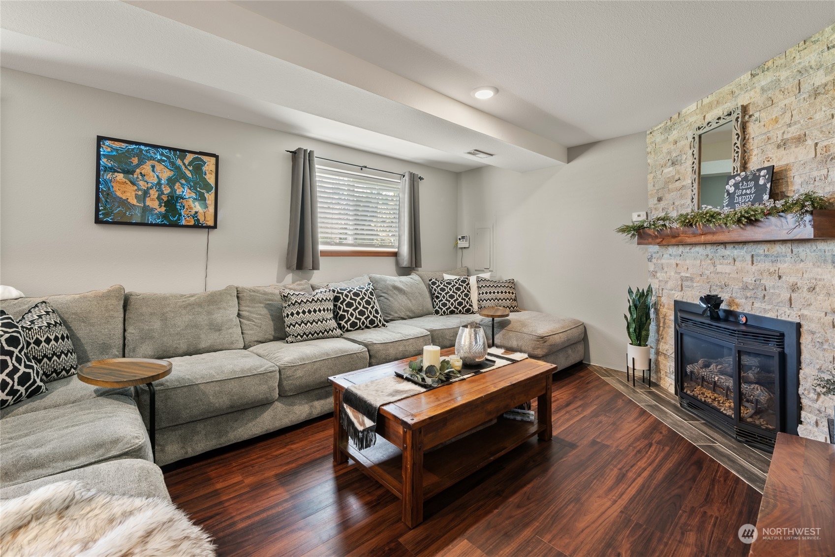 323 Edgewater Lane Lynden, WA 98264 - Photo 15 of 40 a living room with furniture and a fireplace