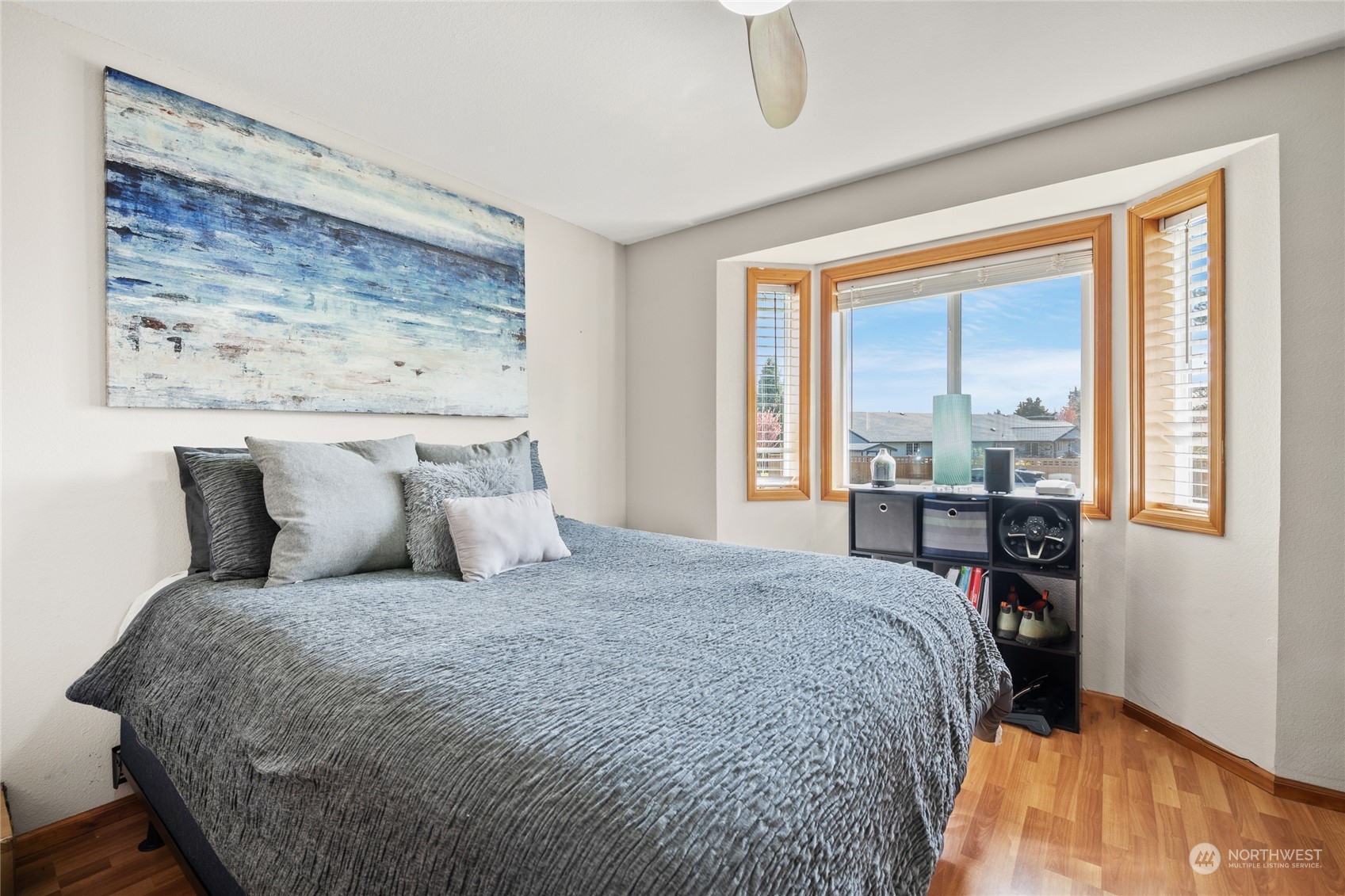 323 Edgewater Lane Lynden, WA 98264 - Photo 18 of 40 a large bed sitting in a bedroom next to a window