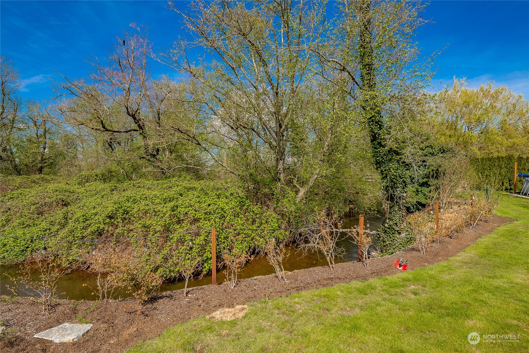 323 Edgewater Lane Lynden, WA 98264 - Photo 33 of 40 a view of outdoor space and front view of a house