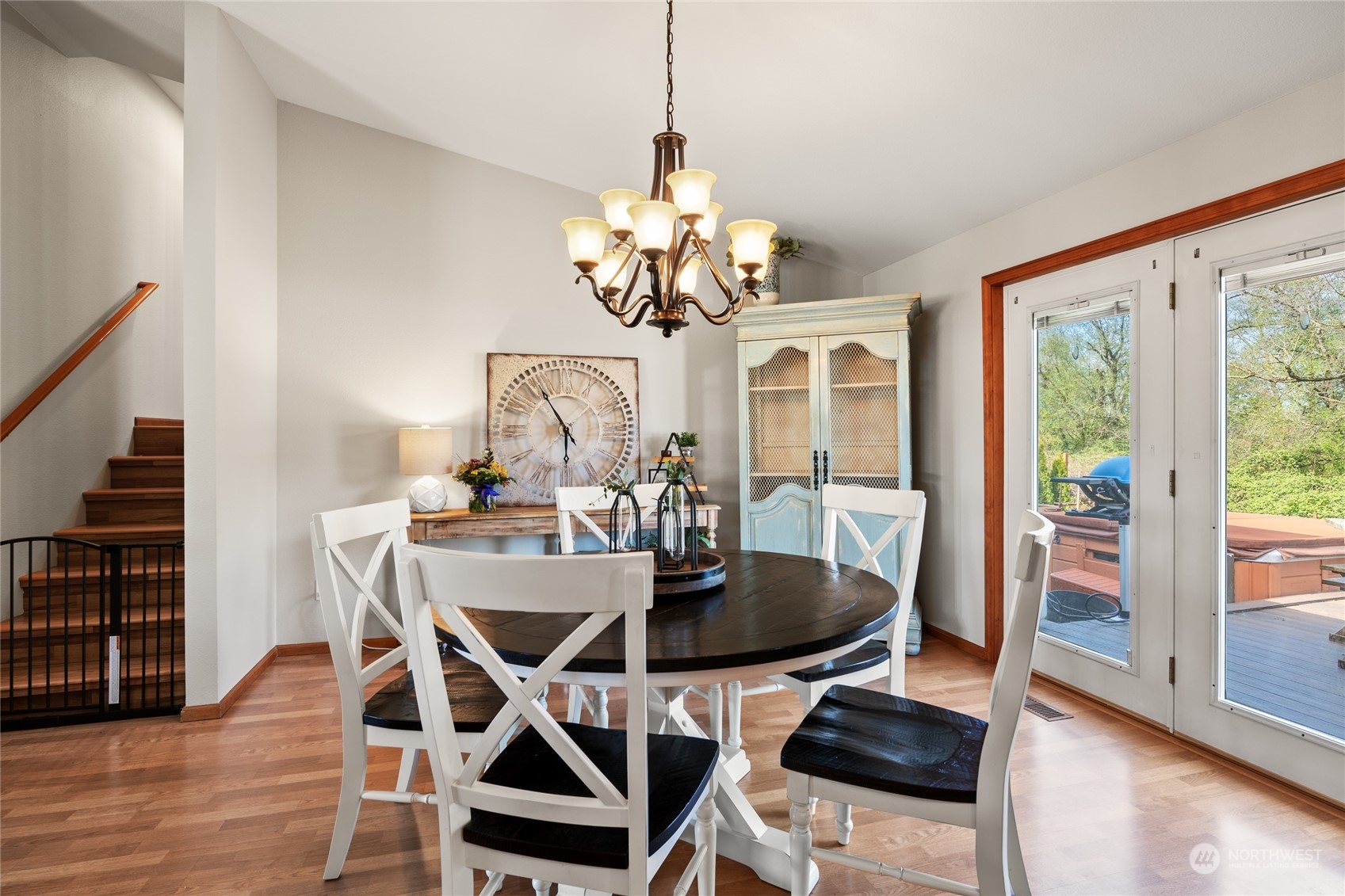 323 Edgewater Lane Lynden, WA 98264 - Photo 10 of 40 a view of a dining room with furniture wooden floor and chandelier