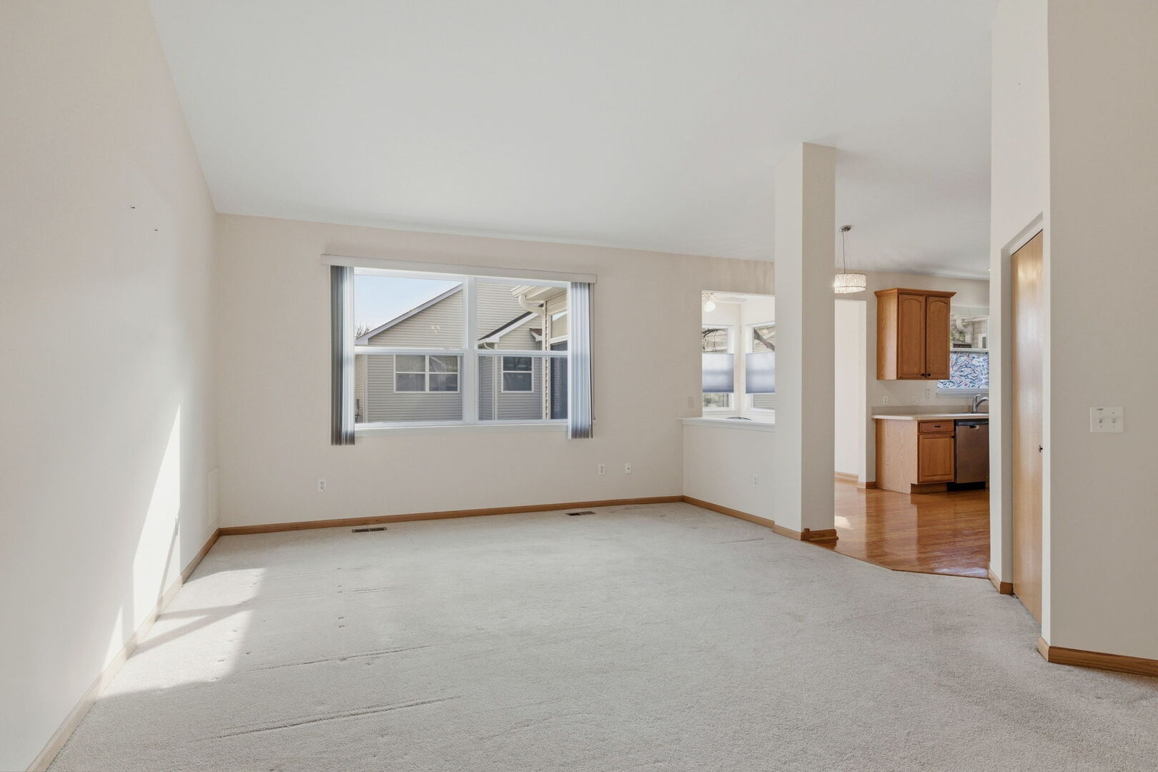1547 Cadillac Circle Romeoville, IL 60446 - Photo 2 of 21 an empty room with windows