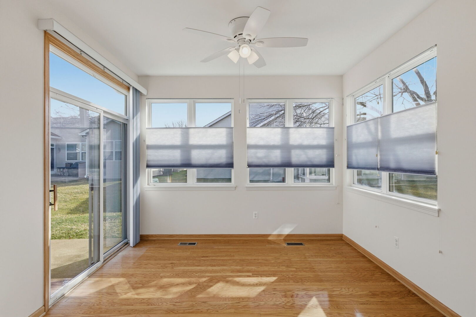 1547 Cadillac Circle Romeoville, IL 60446 - Photo 10 of 21 a view of an empty room with a window