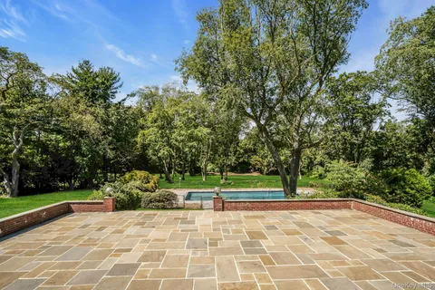a view of backyard with green space