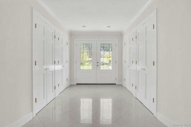 a view of entryway with front door