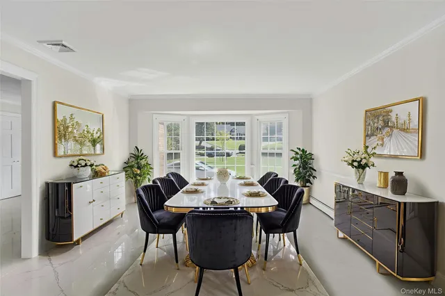 a dining room with furniture and window