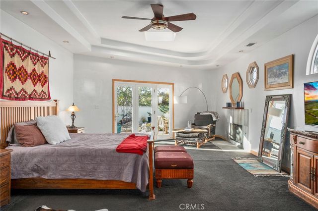 a kitchen with stainless steel appliances granite countertop a sink a stove a counter space and cabinets