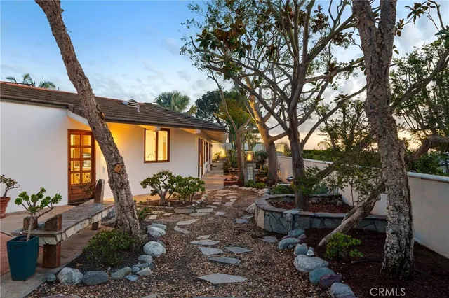a backyard of a house with lots of green space