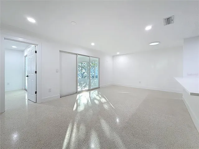 an empty room with windows