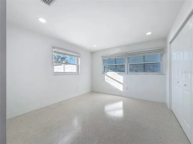 a bathroom with a bathtub and a toilet