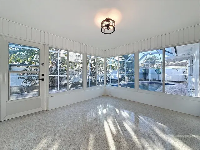 a view of a backyard of the house