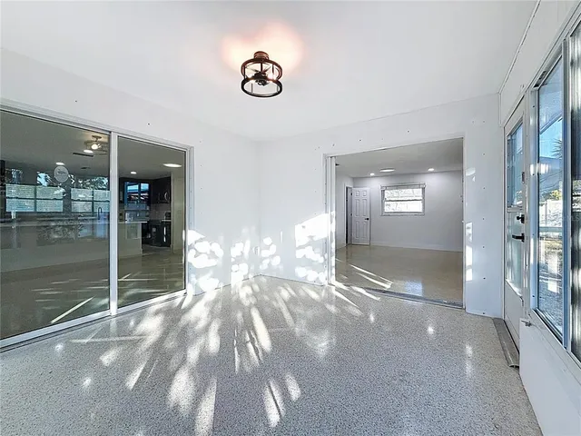 an aerial view of a house with a garden