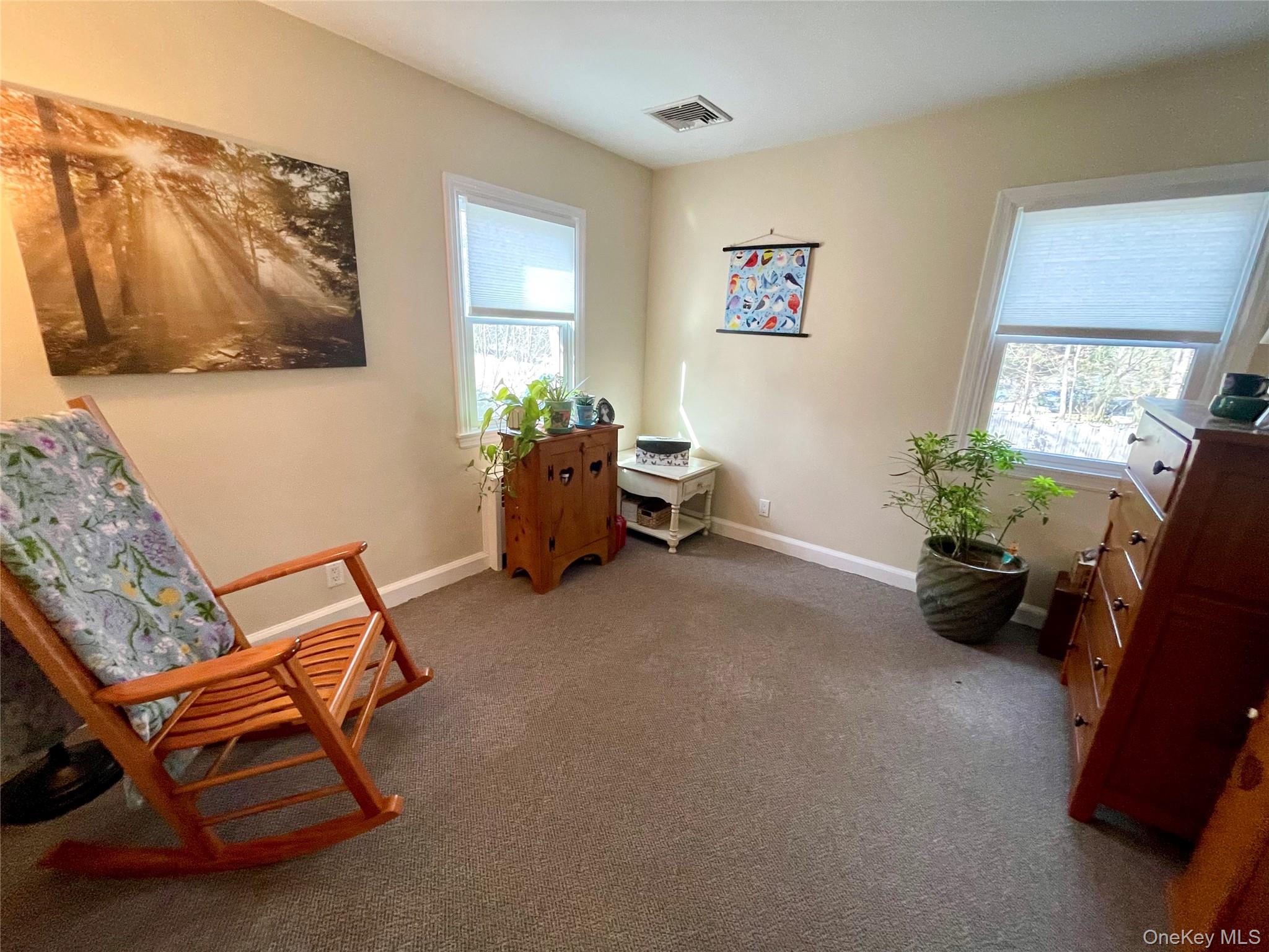 4 Sylvan Way Suffern, NY 10901 - Photo 19 of 39 a living room with furniture and a potted plant