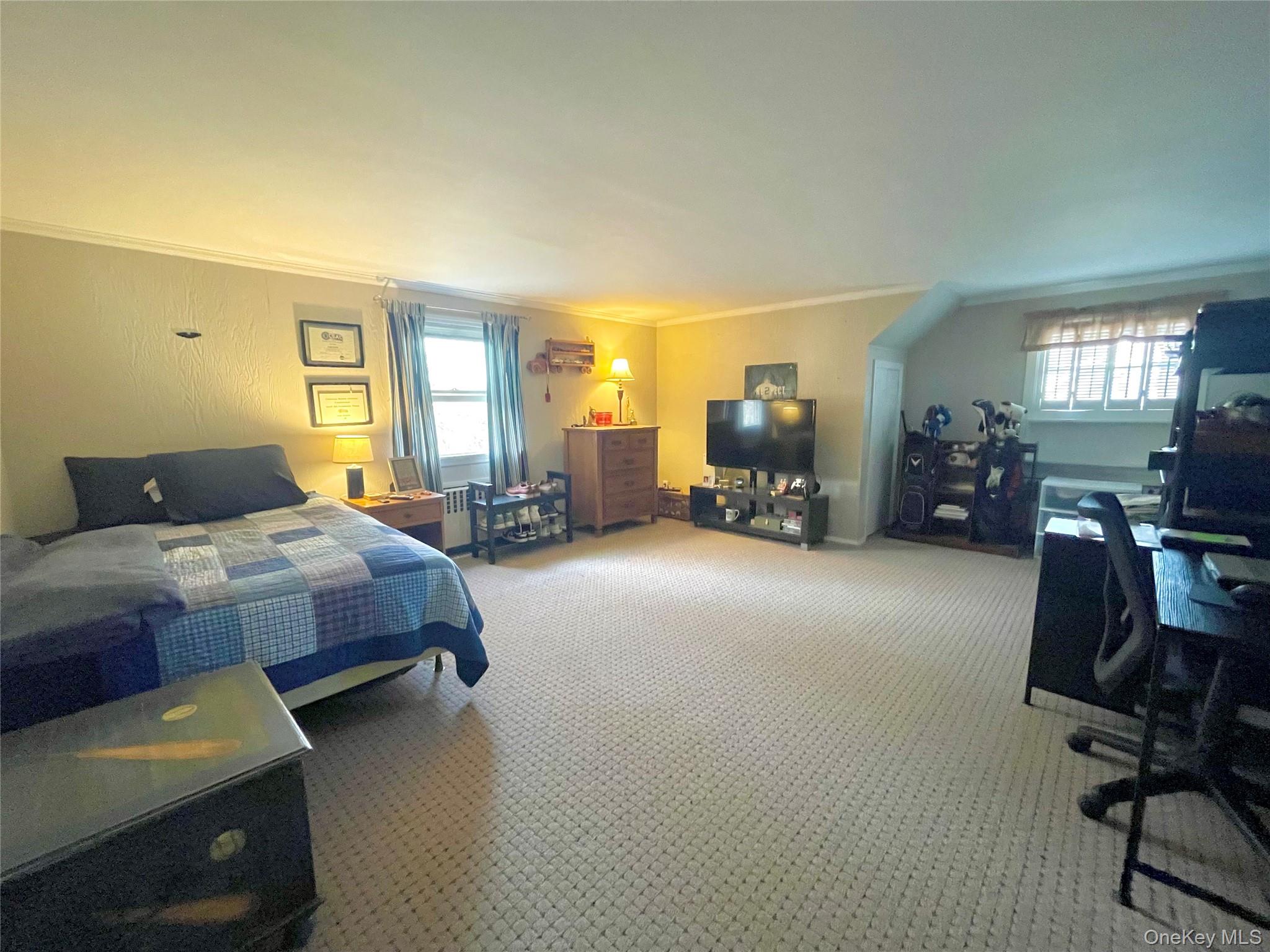 4 Sylvan Way Suffern, NY 10901 - Photo 20 of 39 a bedroom with a bed gym equipment and view living room