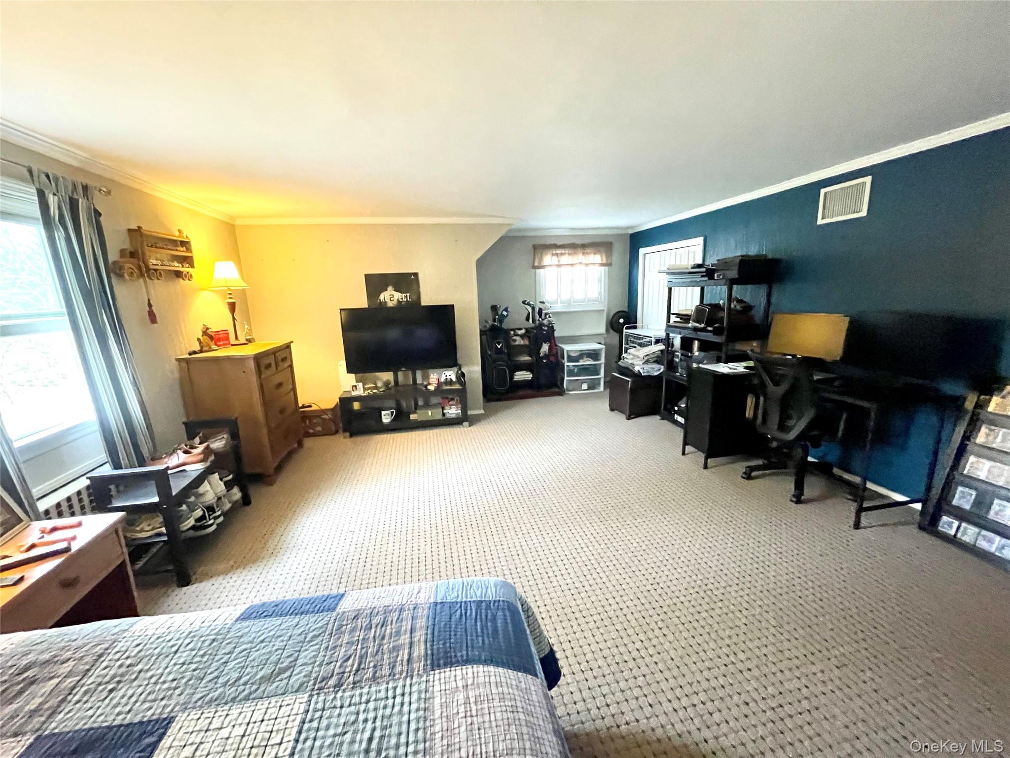 4 Sylvan Way Suffern, NY 10901 - Photo 21 of 39 a room with furniture and a flat screen tv