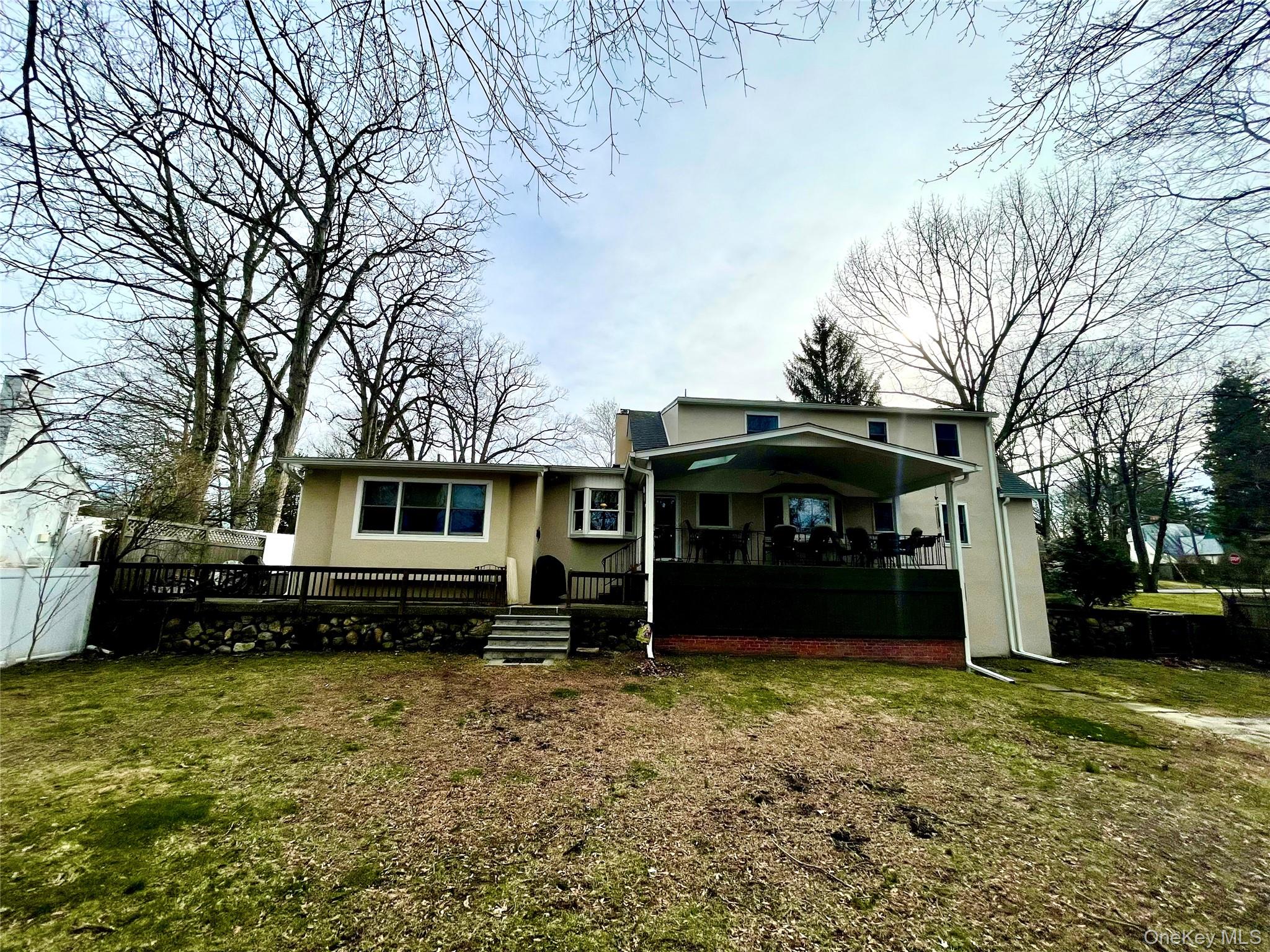 4 Sylvan Way Suffern, NY 10901 - Photo 34 of 39 a front view of a house with a yard