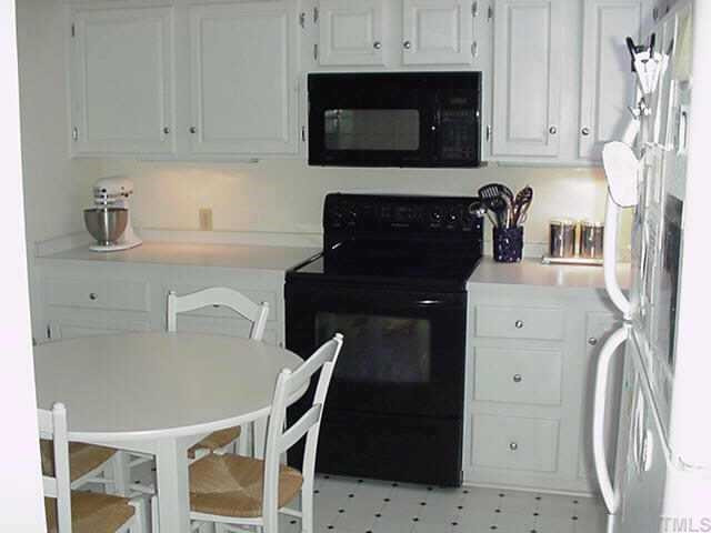 1206 Watauga Street Raleigh, NC 27604 - Photo 5 of 10 Light, bright eat-in white and black kitchen... Other