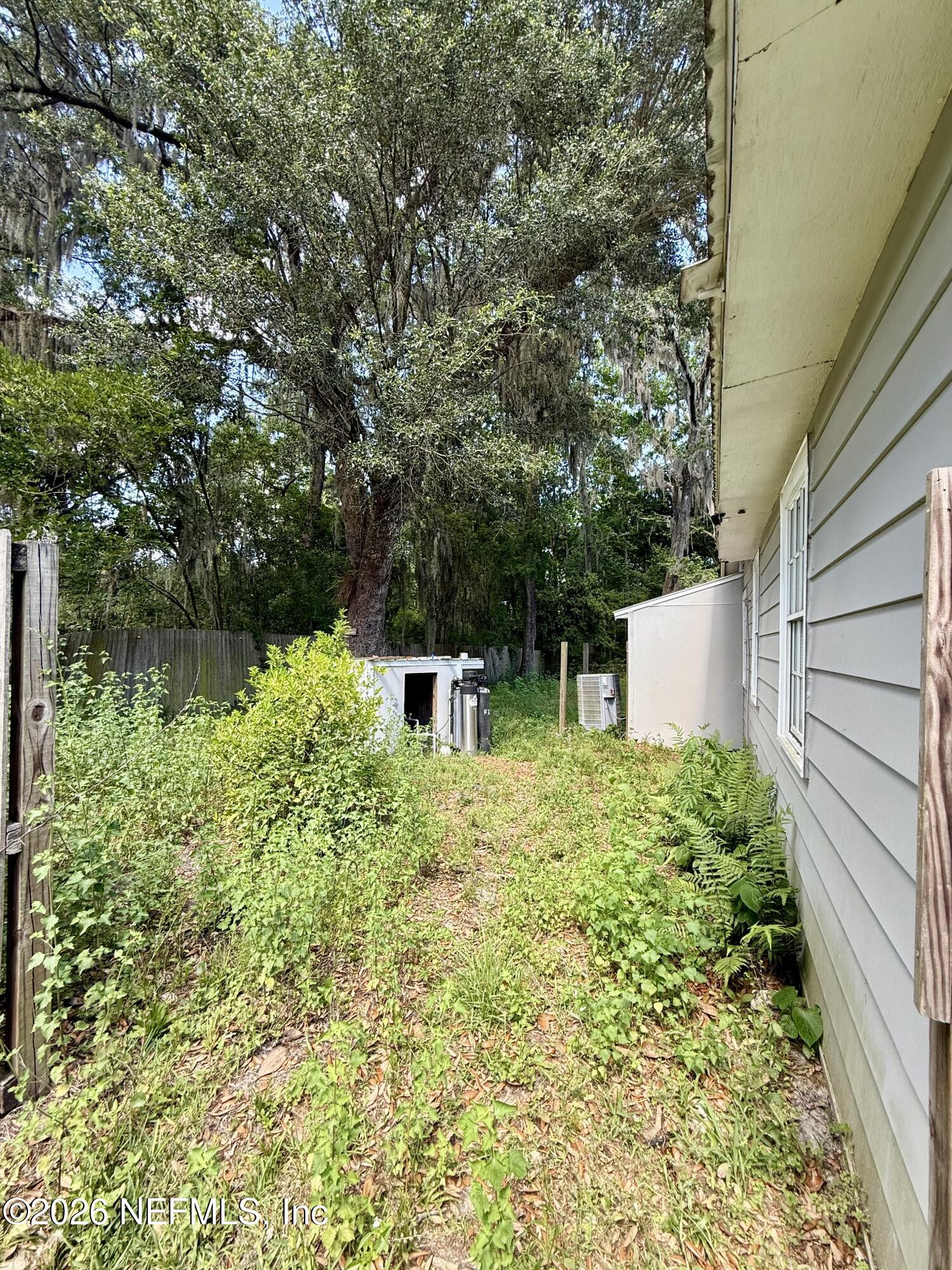 10565 Bessent Road North Jacksonville, FL 32218 - Photo 13 of 16 Side of the House